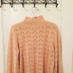 Pink turtleneck sweater